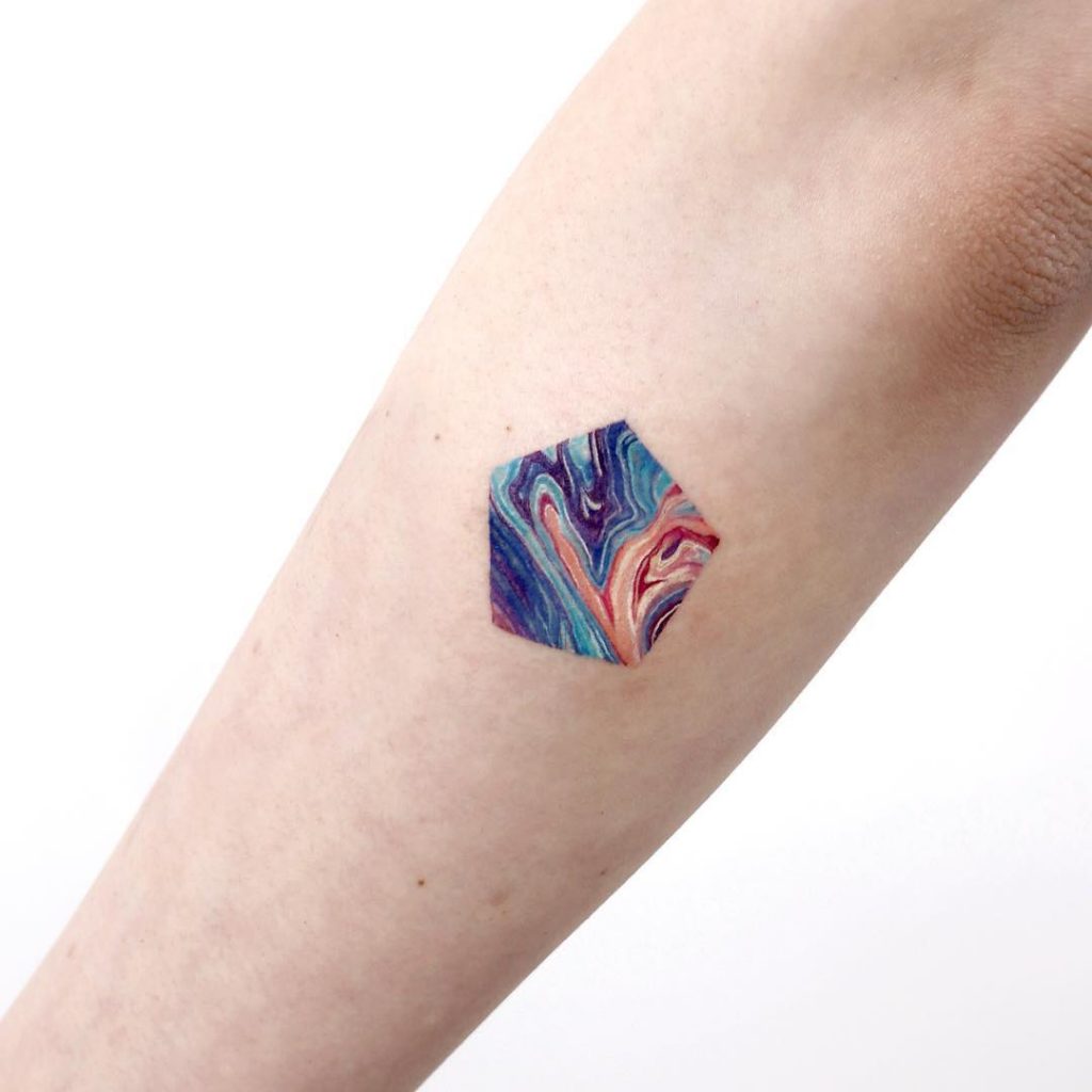 Small cranberries on the forearm