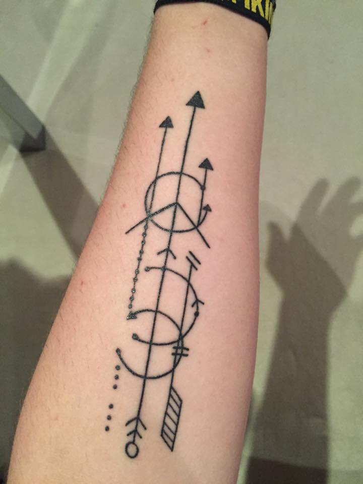 Arrows tattoo on the arm