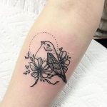 Bird tattoo on the arm