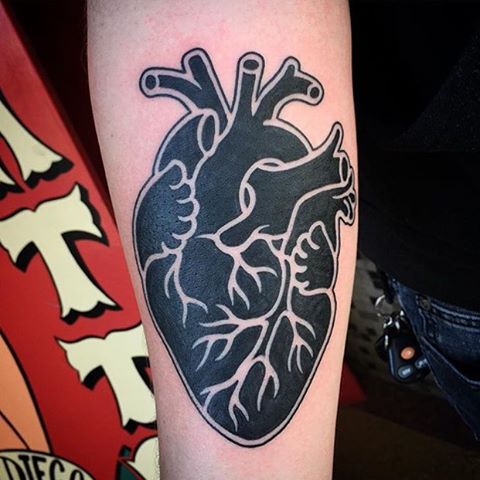 Black and white heart tattoo