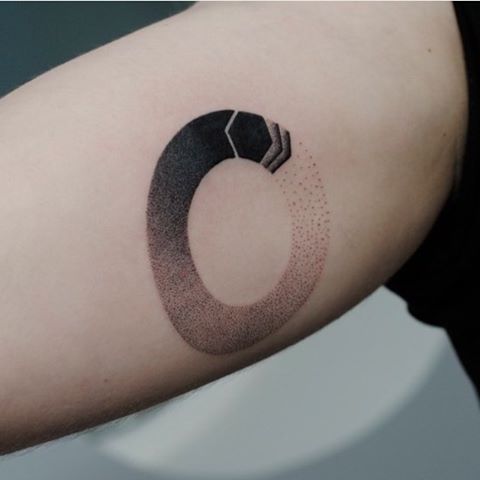 Black gradient circle tattoo