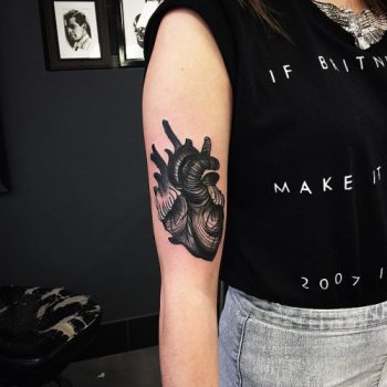 Black heart tattoo