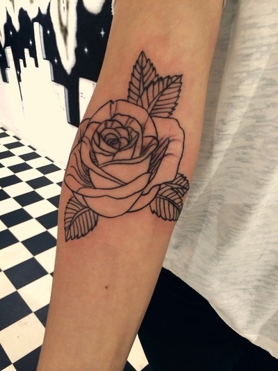 Black outline rose tattoo