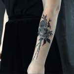 Black rose bouquet tattoo