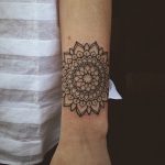 Black simple mandala tattoo