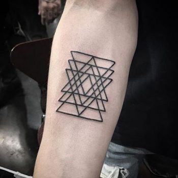 Black triangle tattoos on the arm