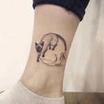Cat tattoo on the ankle