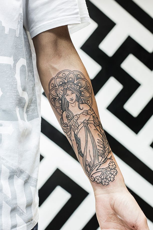 Celtic lady tattoo on the left arm
