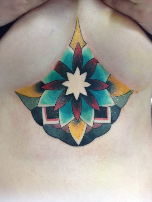 Colorful floral mandala tattoo