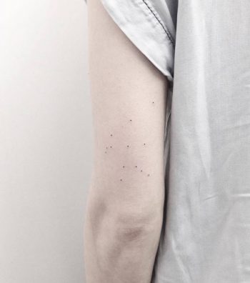 Constellation tattoo on the back of the arm