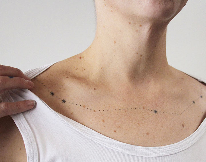 Constellation tattoo on the clavicle bone