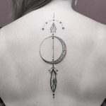 Crescent moon and arrow tattoo on the back