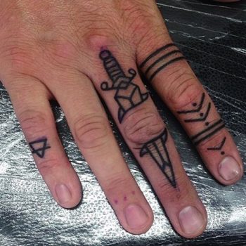 Dagger tattoo on the finger