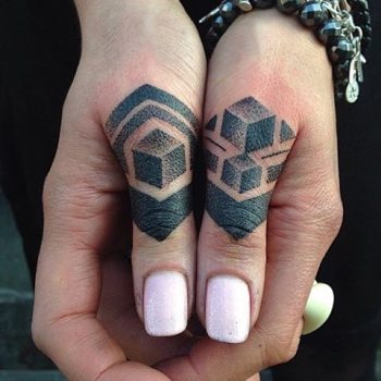 Dot work geometric tattoos on fingers