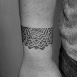Dotwork half mandala tattoo on the wrist