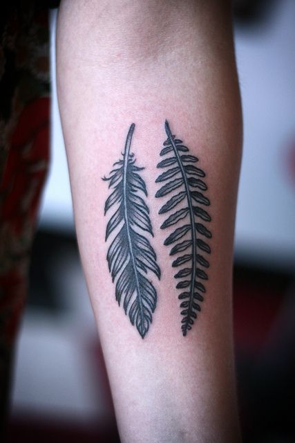 Feather and fern leave tattoo
