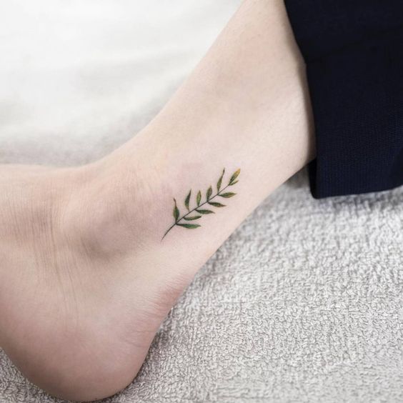 Fern leaf tattoo on the ankle