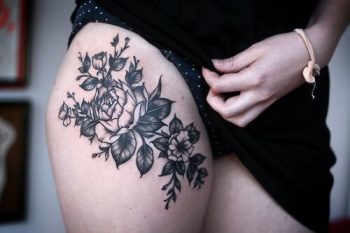 Flower thigh tattoo
