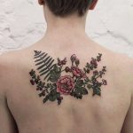Flowers tattoo on the upper back