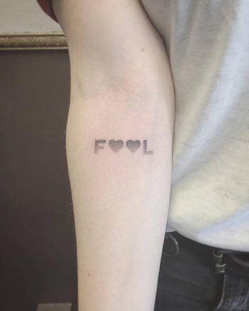 Fool tattoo on the arm