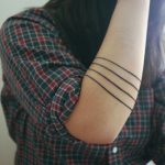 Four lines tattoo