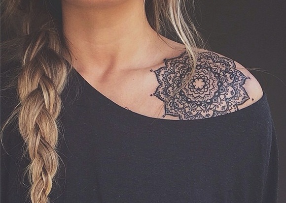 Gorgeous mandala tattoo on the left shoulder