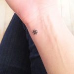 Hashtag symbol tattoo on the wrist