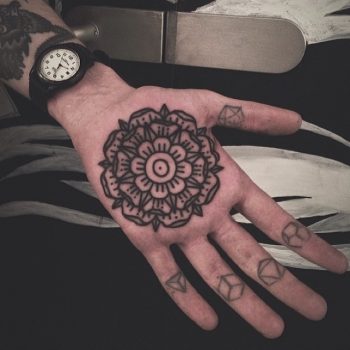 Mandala tattoo on palm