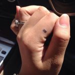 Micro tattoo on the finger