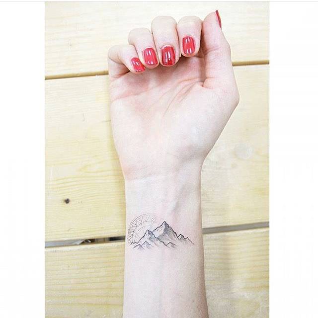Mountain tattoo on the wrist