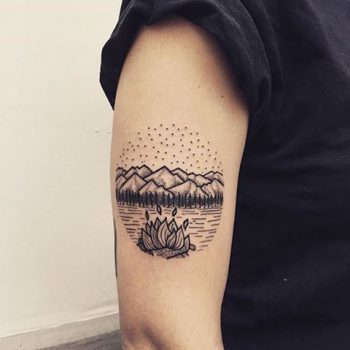 Mountains tattoo on the arm