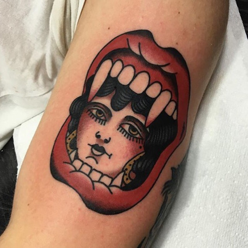 Mouth and face tattoo