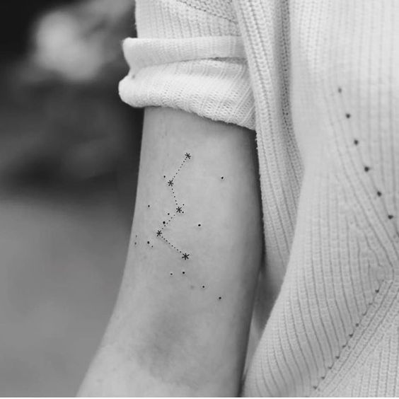 Orion constellation tattoo on the bicep