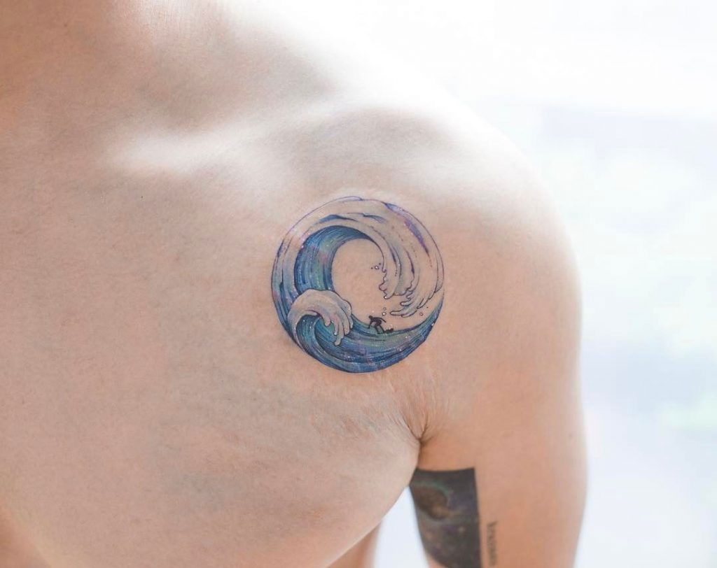 Circular wave tattoo on the shoulder