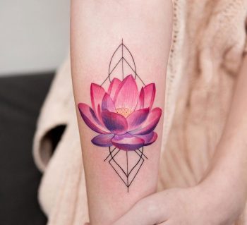 Pink lotus flower tattoo on the arm