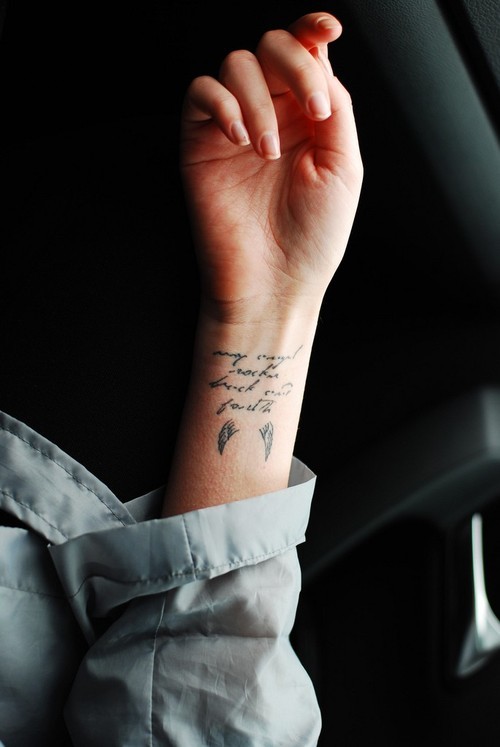 Quote tattoo on the wrist