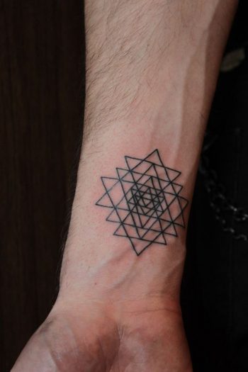 Sacred geometry tattoo on the wrist