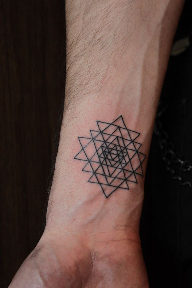 Sacred geometry tattoo on the wrist 