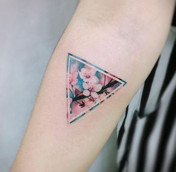 Sakura in a triangle tattoo