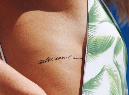 Salt sand sun tattoo on the right rib cage