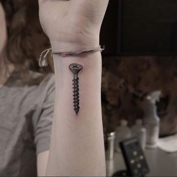 Screw tattoo on the wrist