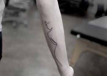Silhouette tattoo on the arm