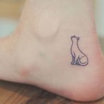 Small cat tattoo on the ankle