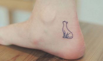 Small cat tattoo on the ankle