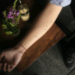 Small constellation tattoo on the arm