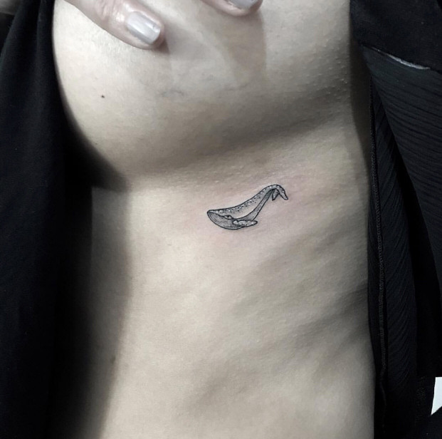 Small whale underboob tattoo 