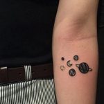 Solar system planets tattoo on the inner arm