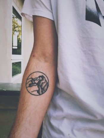 Tattoo of a mountain in the circle