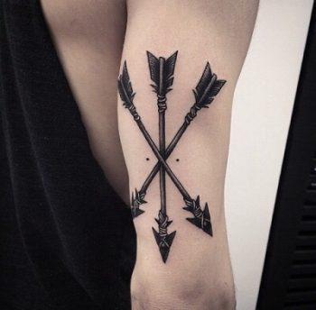 Three arrows tattoo on the arm