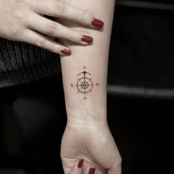 Tiny compass tattoo